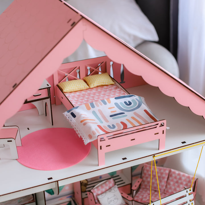 Dollhouse with furniture and text detailing included items