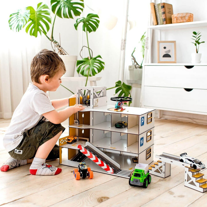 This wooden car garage with elevator (Holz Parkhaus) is designed for active and imaginative play, giving kids a dynamic space to drive, park and explore. The multi-level structure with a working lift makes it easy to move cars between floors, creating a realistic parking experience.