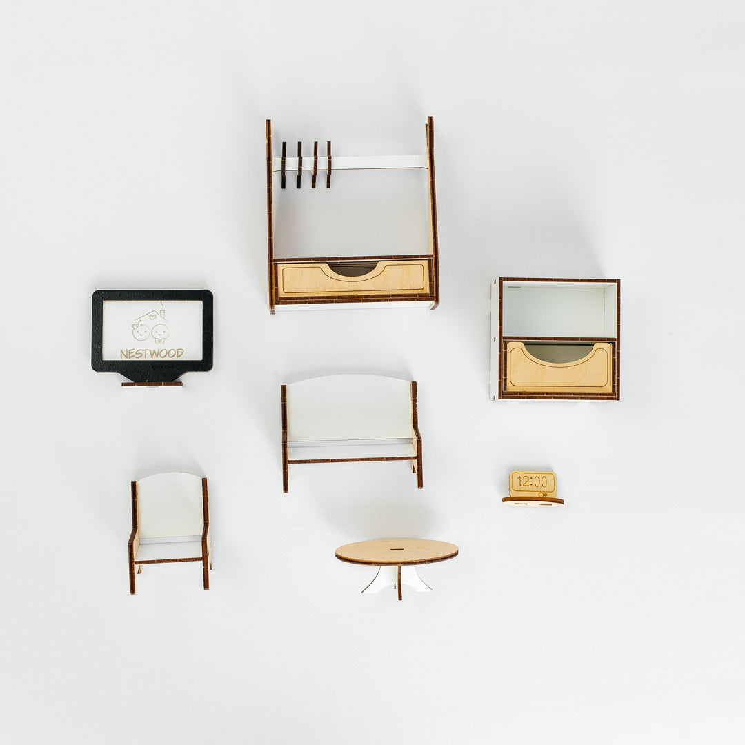A minimalist mid-century modern furniture set displayed against a clean white wall, featuring a wooden wall-mounted shelf with a hanging rod, a small side table, two armchairs with white upholstery, a framed print, and a cabinet with a mirror.
