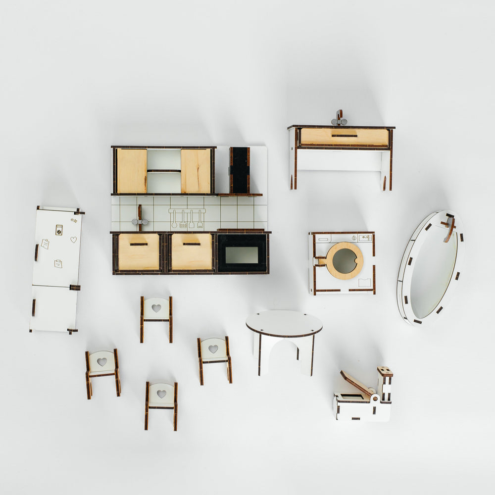 An overhead view of a coordinated furniture set arranged on a clean white background. The set includes multiple chairs, tables, shelving, a console table, a mirror, and a small cabinet, all in a consistent modern design with light wood, white, and dark brown/black elements.