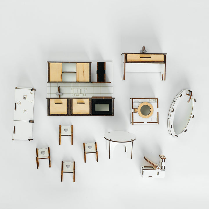 An overhead view of a coordinated furniture set arranged on a clean white background. The set includes multiple chairs, tables, shelving, a console table, a mirror, and a small cabinet, all in a consistent modern design with light wood, white, and dark brown/black elements.