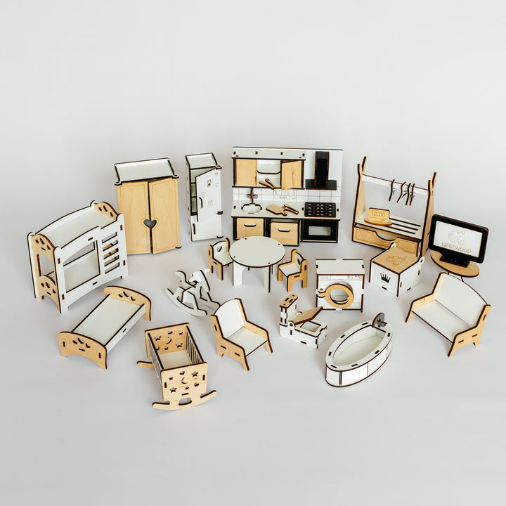 A miniature wooden dollhouse furniture set arranged on a light gray background, including a bed, crib, kitchen cabinets, dining table and chairs, sofa, wardrobe, and other home accessories.