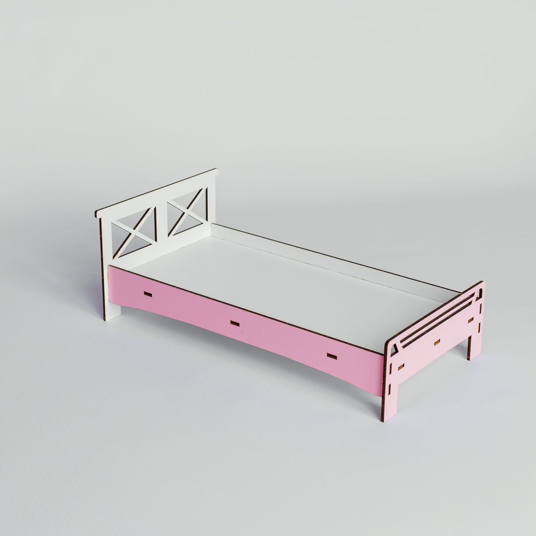 A minimalist wooden bed frame with a light pink footboard and white headboard, shown on a neutral light gray background.