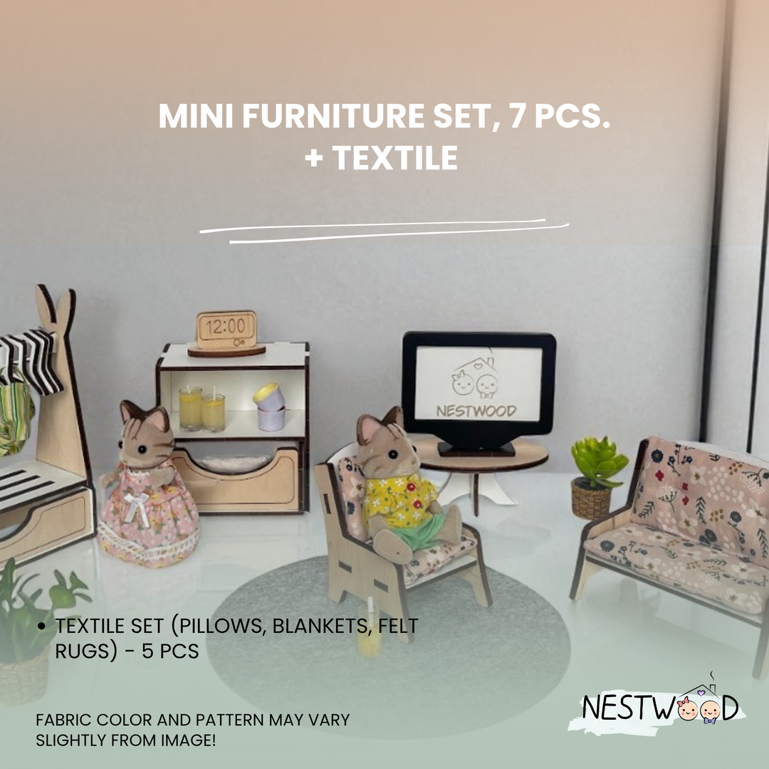Miniature furniture set with textiles on a clear surface, featuring 'NESTWOOD' branding.