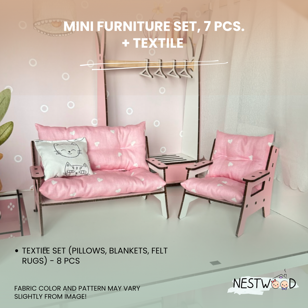 Miniature pink furniture set with textiles on a white background, featuring the NESTWOO brand.