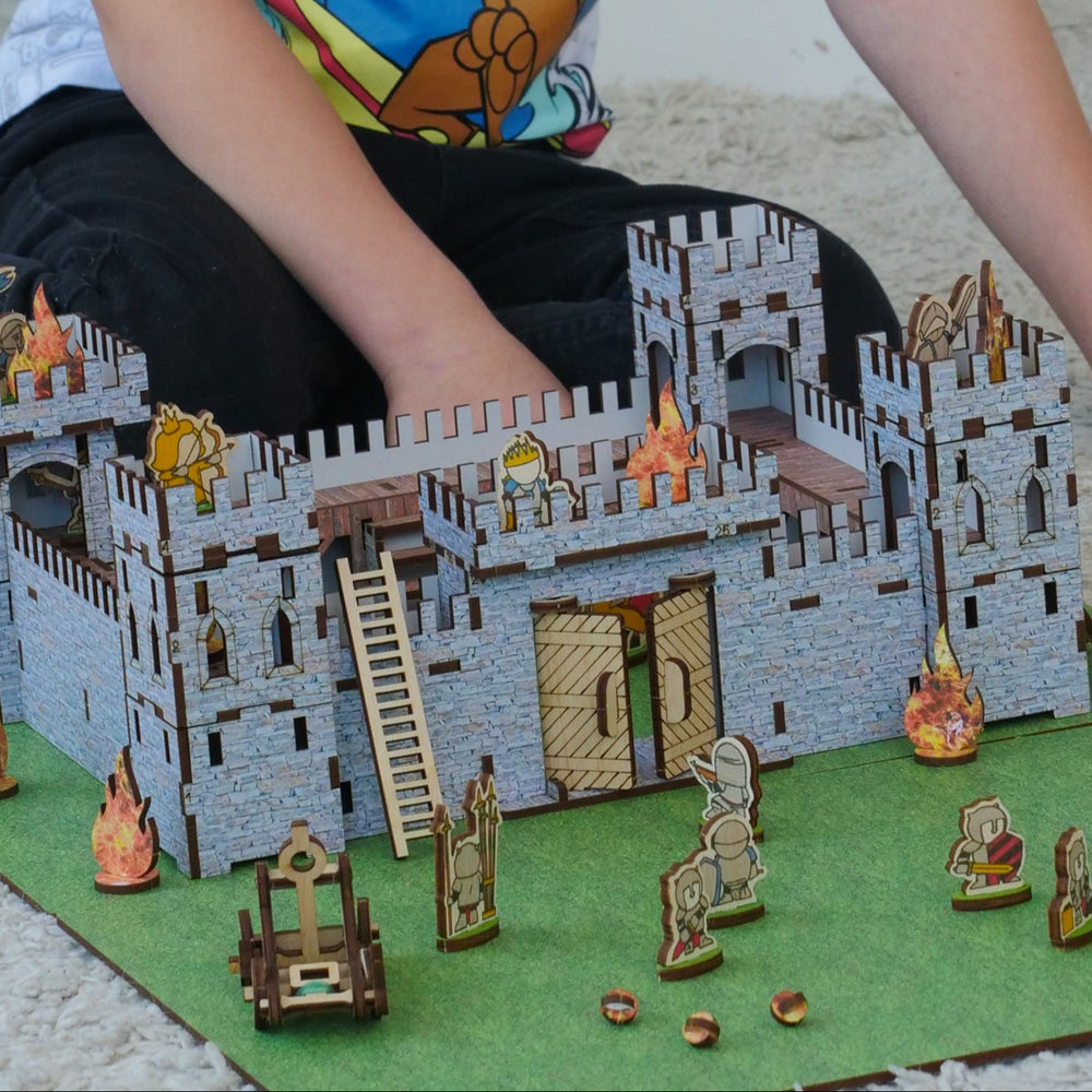 Wooden medieval castle playset by NestWood, featuring a modular design with soldier figurines, a functional catapult, and fortress walls. Made from eco-friendly HDF and birch plywood, this 3D puzzle castle is perfect for kids’ role-playing games, historical battles, and dollhouse accessories