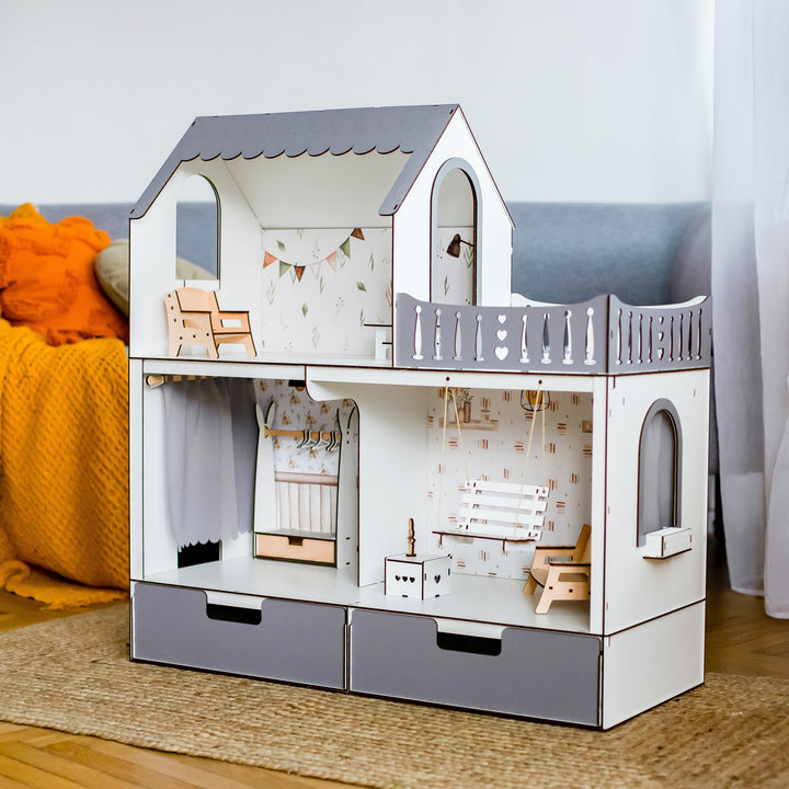 Two-story dollhouse with furniture in a room setting