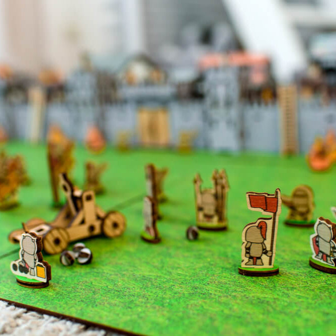 A wooden medieval castle playset featuring a modular design for creative role-play. Includes toy knights, catapults, and fortress walls, perfect for kids’ medieval battles. An eco-friendly wooden toy, designed as a 3D puzzle castle