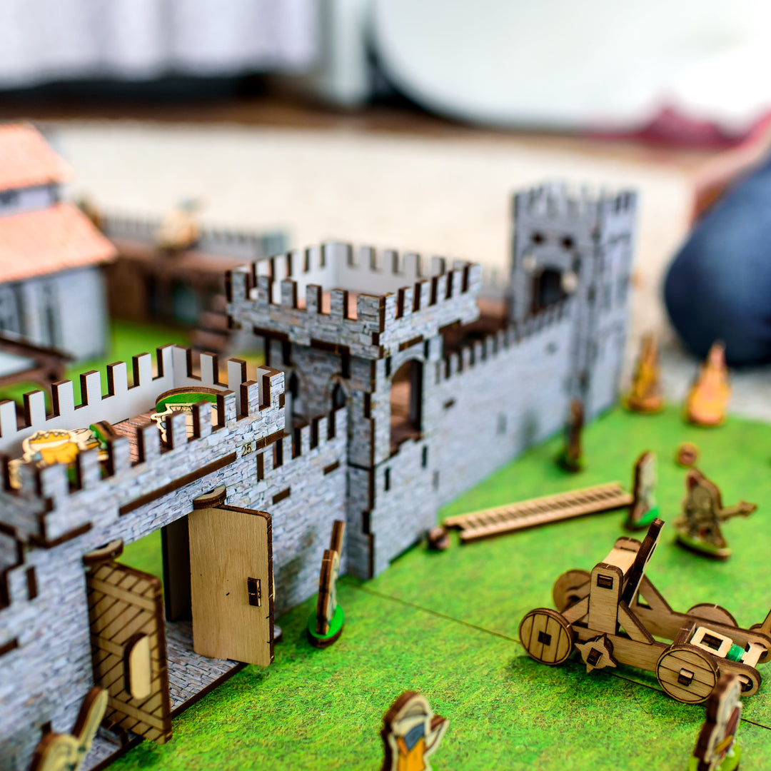 A wooden medieval castle playset featuring a modular design for creative role-play. Includes toy knights, catapults, and fortress walls, perfect for kids’ medieval battles. An eco-friendly wooden toy, designed as a 3D puzzle castle